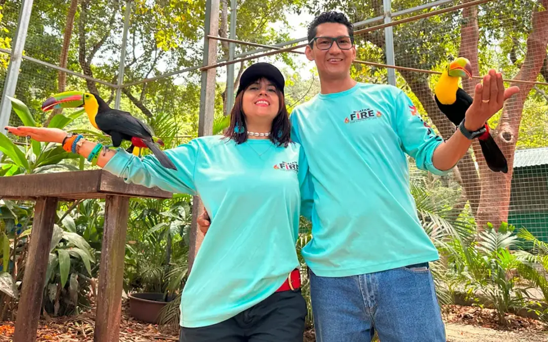 Ronys and Evlyn with two toucans on the Canopy, Maya Eden and Beach tour in Roatan